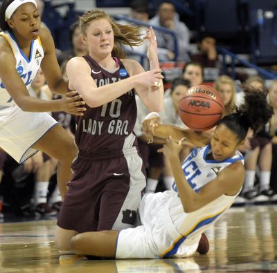 UCLA’s Rebekah Gardner, right, takes a shot to the head from a pass by Montana’s Kenzie De Boer. (Christopher Anderson)