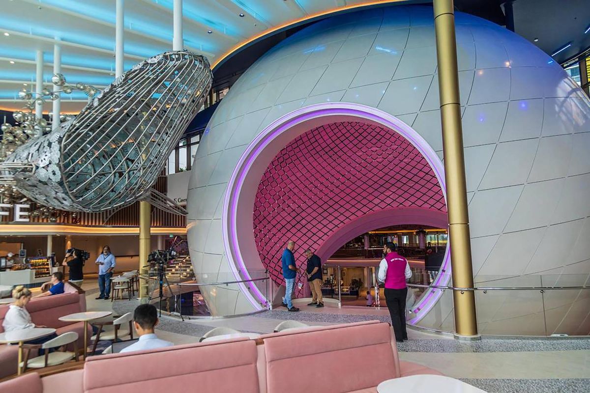 View of the five-deck-tall Pearl, and the Pearl Cafe inside, on Royal Caribbean’s Icon of the Seas, the world’s largest cruise ship. It is docked at PortMiami after arriving Jan. 10 at its home base for the first time.  (Pedro Portal/El Nuevo Herald/TNS)