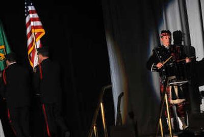 
Above: Thomas Stredwick, right, the public affairs officer for the American Red Cross, rings in the start of the second annual event with the sounds of bagpipes and drums. 
 (Photos by Rajah Bose / The Spokesman-Review)