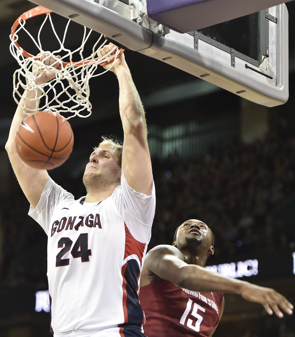 Gonzaga’s Przemek Karnowski powered inside Wednesday for eight rebounds and tied his career high with 22 points, including this first-half dunk against Washington State’s Junior Longrus. (TYLER TJOMSLAND PHOTOS)