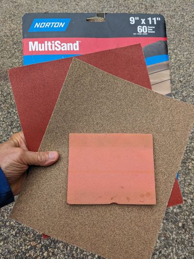 These are just a few samples of the many types of sandpaper in my shop. The small one is a flexible pad made to sand three-dimensional shapes.  (Tribune Content Agency)