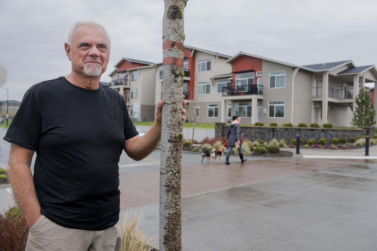 Jim Frank stands April 12 in the Kendall Yards development. Frank is the CEO of Greenstone, one of the largest residential and commercial developers in the region. He said he enjoys the process of planning  communities from beginning to end. (Jesse Tinsley / The Spokesman-Review)