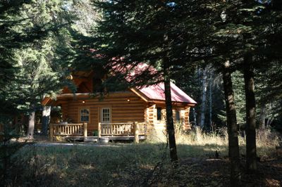 Western Pleasure Guest Ranch, northeast of Sandpoint, rents out log cabins like this. (File / The Spokesman-Review)