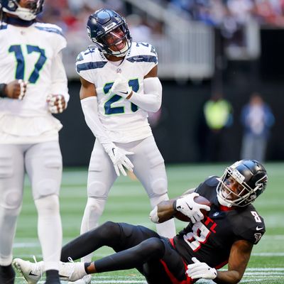 Seattle Seahawks cornerback Devon Witherspoon celebrates a tackle on Atlanta tight end Kyle Pitts, preventing him from picking up the first down during the fourth quarter Oct. 20 at Mercedes-Benz Stadium in Atlanta.  (Jennifer Buchanan)