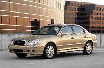 
A 2004 Sonata made by Hyundai, which will equip all U.S.-bound vehicles with XM satellite radio, beginning next year.
 (Associated Press / The Spokesman-Review)
