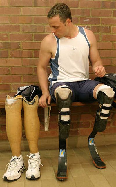 
Oscar Pistorius runs with curved prosthetic blades. Associated Press
 (Associated Press / The Spokesman-Review)