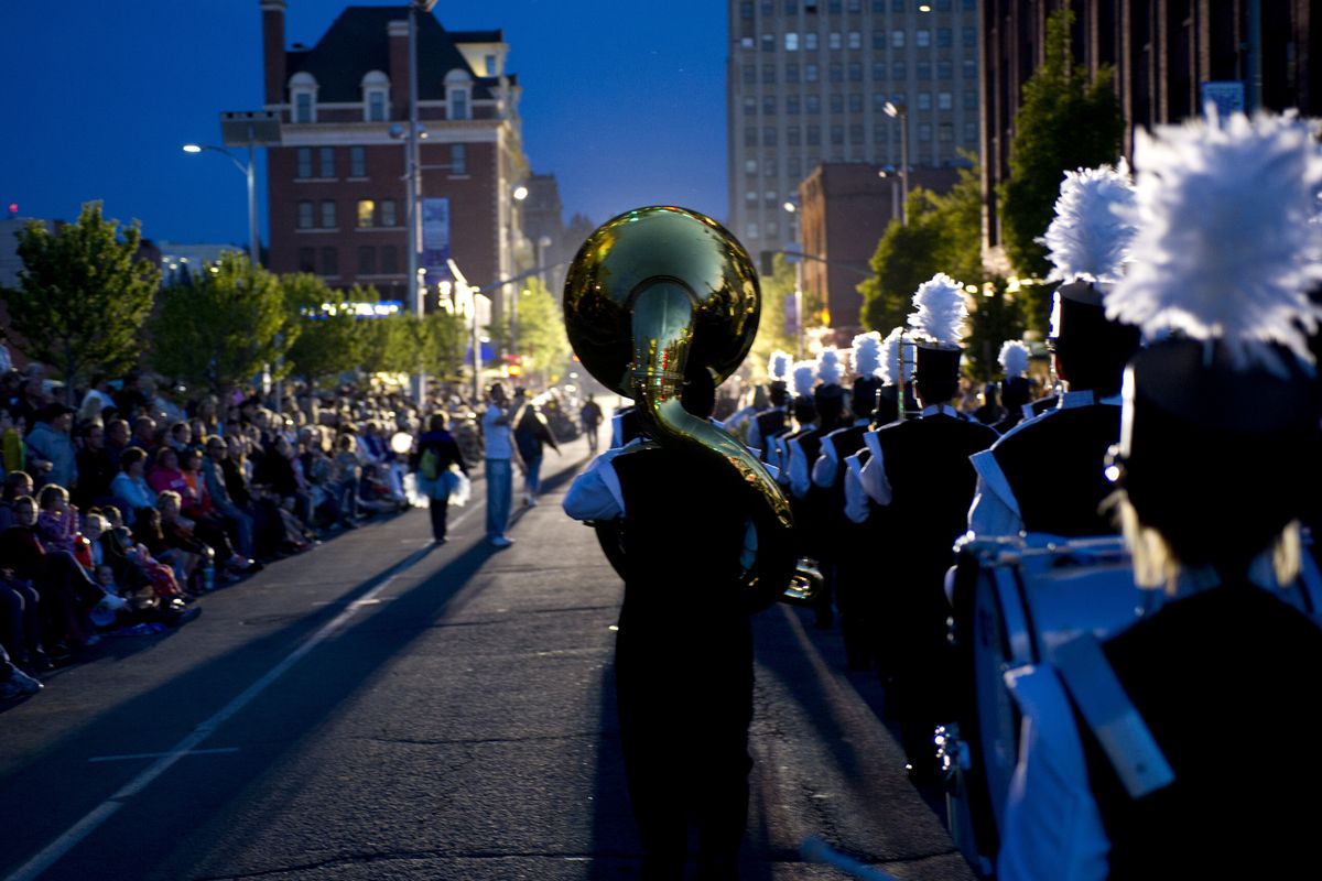 The Rogers High School band performs during the 2012 Lilac Festival Armed Forces Torchlight Parade in downtown Spokane on Saturday. (Tyler Tjomsland)