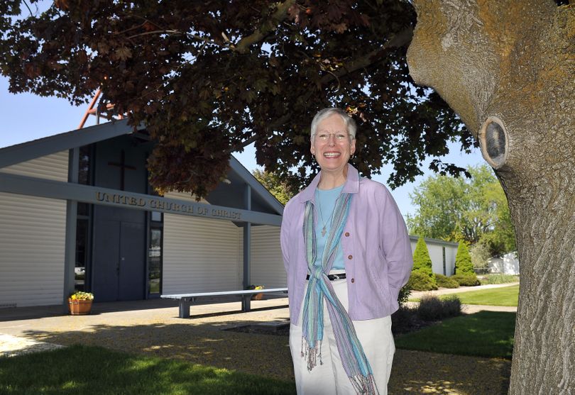 Linda Crowe, pastor of Veradale United Church of Christ for the past 17 years, is shown outside the church on Tuesday. She is retiring. (Jesse Tinsley)