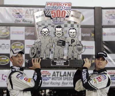 
Jimmie Johnson, right, won his second consecutive race.Associated Press
 (Associated Press / The Spokesman-Review)