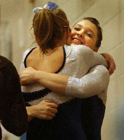 
Mead's Maya Morgan, right, and Courtney Sexton celebrate. 
 (Brian Plonka / The Spokesman-Review)