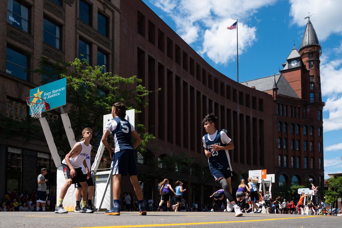Hoopfest teams compete along Riverside Avenue in downtown Spokane on Saturday, June 29, 2019. (Colin Mulvany / The Spokesman-Review)