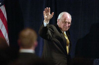 
Vice President Dick Cheney, waving after an appearance in Chicago on Friday, said a secret program that allows U.S. officials to examine private banking records is 
