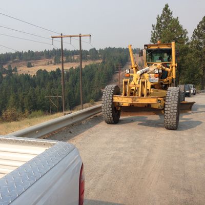 Spokane County owns 35 grading trucks, like the one shown above, that have remained out of service this summer due to dry conditions and worries about sparking a fire. (Kip Hill)