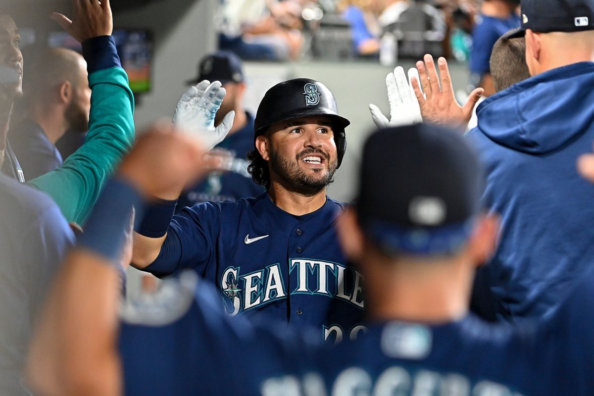 Eugenio Suarez of the Seattle Mariners celebrates with teammates after hitting a two-run home run during the seventh inning against the Washington Nationals at T-Mobile Park on Tuesday, Aug. 23, 2022, in Seattle. (Alika Jenner/Getty Images/TNS)  (Alika Jenner)