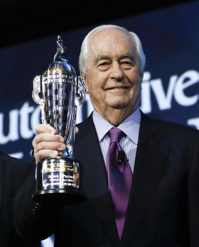 In this Jan. 16, 2019 photo, Roger Penske holds his 