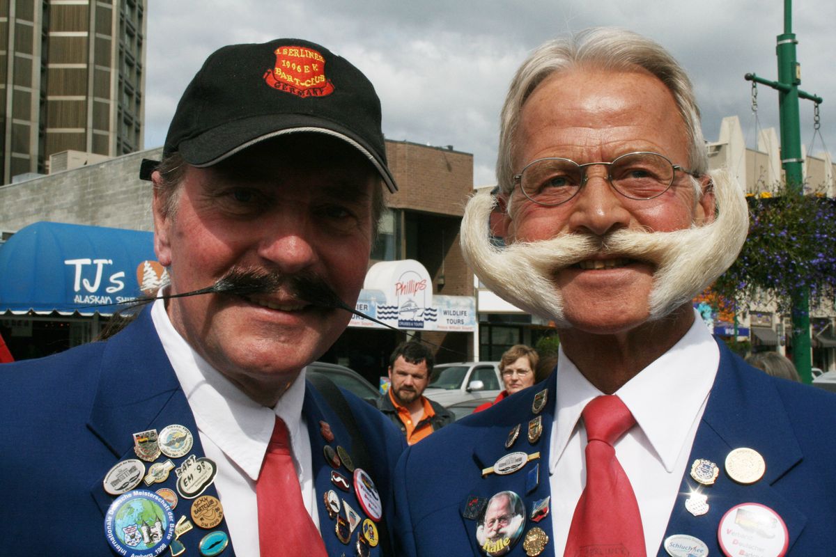 Lutz Giasa, left, and Karl-Heinz Hiller, both of Berlin, Germany, are shown  Friday before the start of a parade kicking off the 2009 World Beard and Moustache Championships in Anchorage, Alaska.  (Associated Press / The Spokesman-Review)