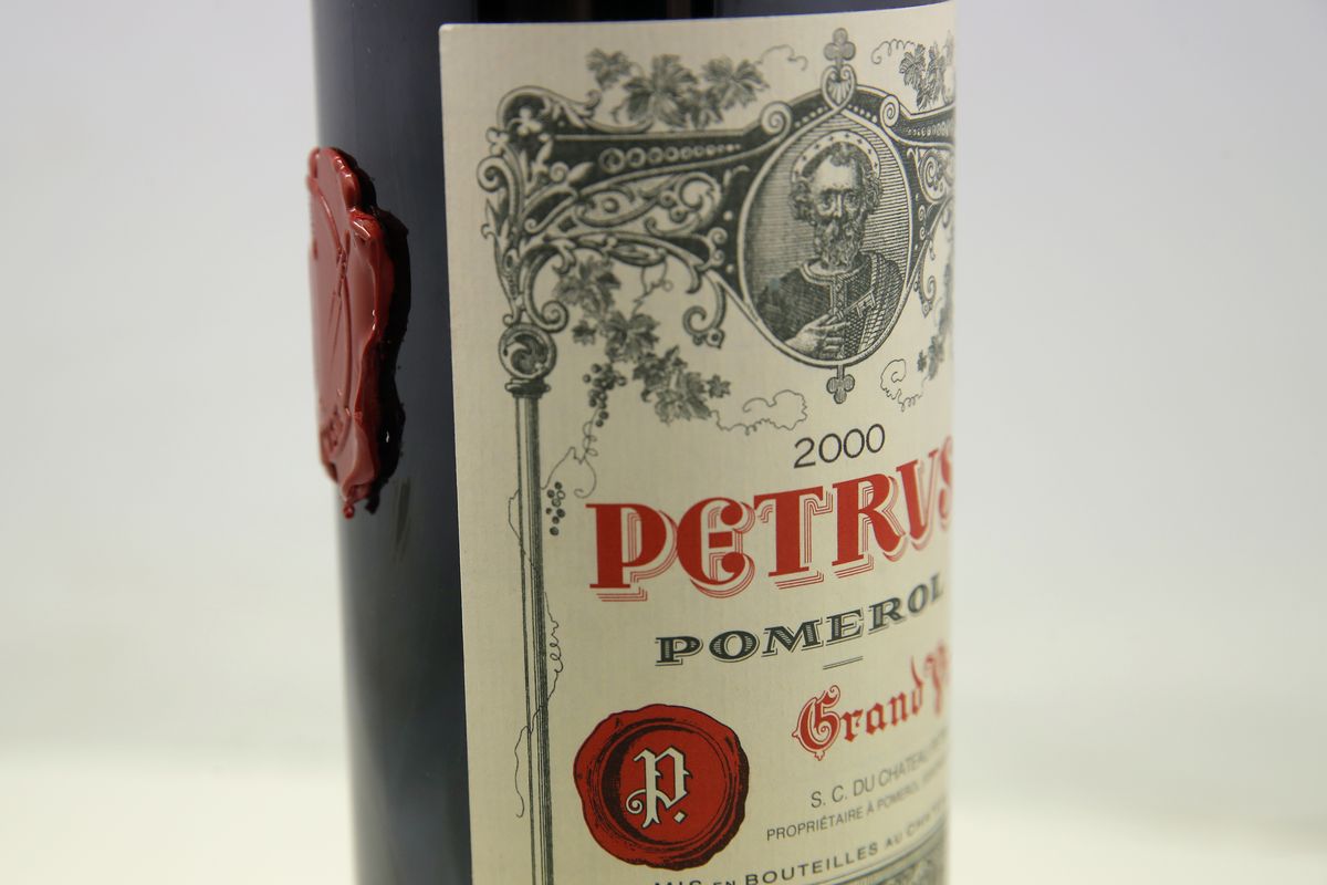 A bottle of Pétrus red wine that spent a year orbiting the Earth in the International Space Station is pictured in Paris Monday. The bottle of French wine is up for a private sale at Christie’s, with a stratospheric price tag in the region of $1 million.  (Christophe Ena)