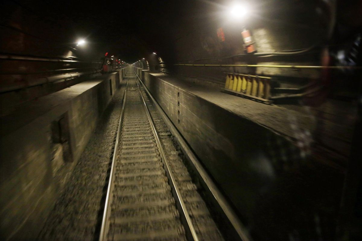 This Aug. 17, 2015, photo shows a train tunnel under the Hudson River as seen from the back of an Amtrak train bound for New York’s Penn Station. (Mel Evans / File/Associated Press)