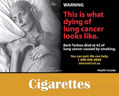 At right is a photo of the late Barb Tarbox that will appear on cancer warning labels on cigarette packages in Canada. In the U.S., the FDA rejected the Tarbox photo as too disturbing and will instead use the label pictured below. (Associated Press)
