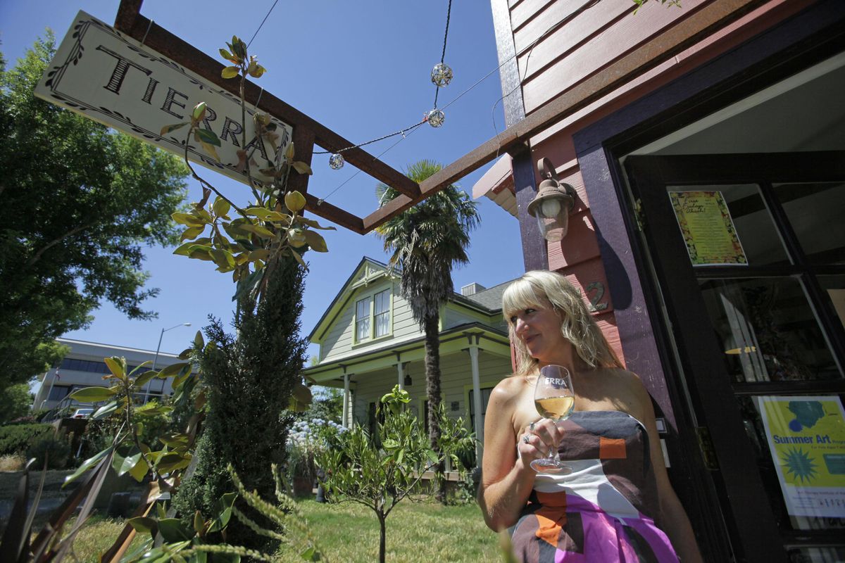 Nicole Martensen stands outside her Tierra art, garden and wine shop in Ukiah, Calif., where business owners say the extra cash they get from selling medical marijuana is crucial. “I really don’t think we would exist without it,” says Martensen. Associated Press photos (Associated Press photos / The Spokesman-Review)