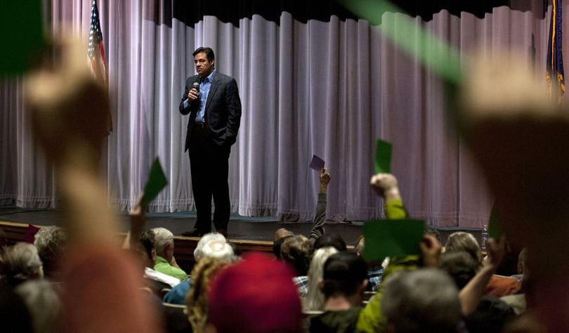 Rep. Raul Labrador talks to the crowd Friday during the town hall meeting at Lake City High School. (Kathy Plonka / The Spokesman-Review)