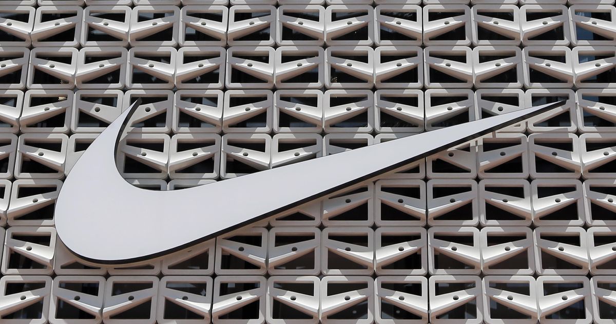 The Nike logo is shown at a store Aug. 8, 2017, in Miami Beach, Fla. (Alan Diaz / Associated Press)