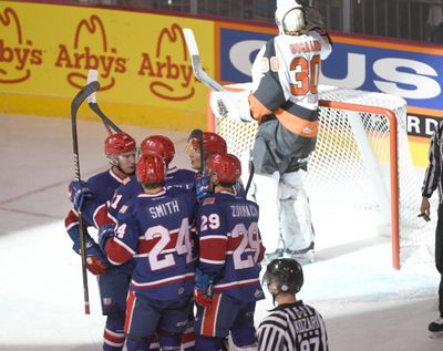 The Spokane Chiefs celebrate a goal by Ethan McIndoe against Medicine Hat on Oct. 5 at the Spokane Arena. (Jesse Tinsley/THE SPOKESMAN-REVI / SR)