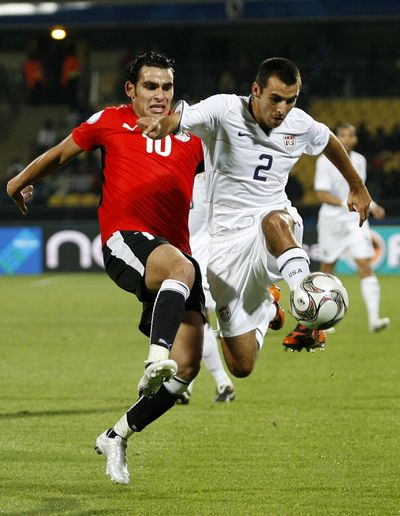 Egypt’s Ahmed Eid, left, battles for the ball with the United States’ Jonathan Bornstein during their Confederations Cup match. (Associated Press / The Spokesman-Review)