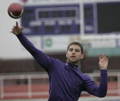 Linfield College quarterback Brett Elliott, shown at practice Thursday, needs one TD pass today to break a record that has stood for 20 years.
(Associated Press / The Spokesman-Review)