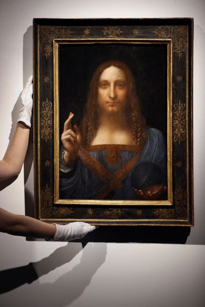 “Salvator Mundi,” the only known painting of Leonardo da Vinci's held in private hands, was auctioned in New York on Wednesday for a record $450 million. (Kirsty Wigglesworth / AP)