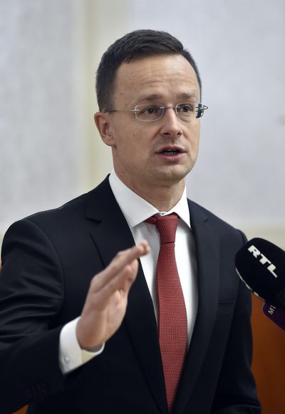 Hungarian Minister of Foreign Affairs and Trade, Peter Szijjarto, holds a press conference in response to the recent remarks by Romanian Prime Minister Mihai Tudose in the Ministry of Foreign Affairs and Trade in Budapest, Hungary, Friday, Jan. 12, 2018. (Zoltan Mathe / Associated Press)