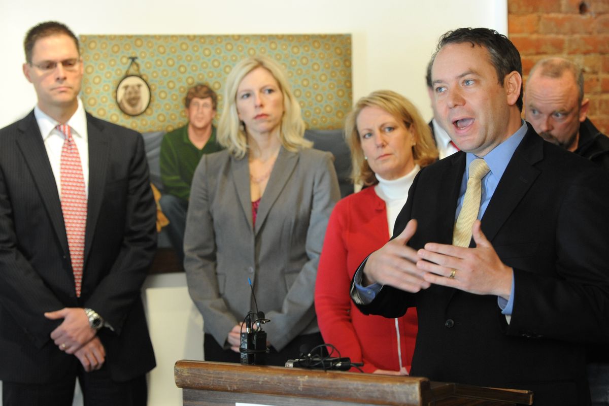 Spokane Mayor-elect David Condon, right, speaks to the media about his transition team Tuesday at Second Space Gallery. He named three of his transition team members, including, from left, Ezra Eckhardt, Katy Bruya, and Theresa Sanders. (Jesse Tinsley)