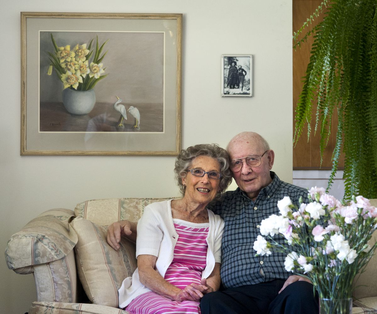 Jackie and Tom Cassis have been married for 61 years. They received the painting on the wall as a wedding gift. (Dan Pelle)