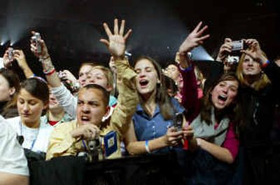 
Young supporters of President Bush cheer as he is introduced at the pre-inaugural youth event at the D.C. Armory on Tuesday in Washington. 
 (Associated Press / The Spokesman-Review)