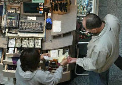 
A shopper, right, pays a vendor while purchasing a wrist watch at the Cambridgeside Galleria Mall, in Cambridge, Mass. Consumers, whose behavior plays a crucial role in shaping economic activity, increased their spending in April.A shopper, right, pays a vendor while purchasing a wrist watch at the Cambridgeside Galleria Mall, in Cambridge, Mass. Consumers, whose behavior plays a crucial role in shaping economic activity, increased their spending in April.
 (Associated PressAssociated Press / The Spokesman-Review)