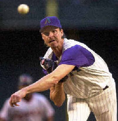 
Randy Johnson is leading the majors in strikeouts. 
 (Associated Press / The Spokesman-Review)