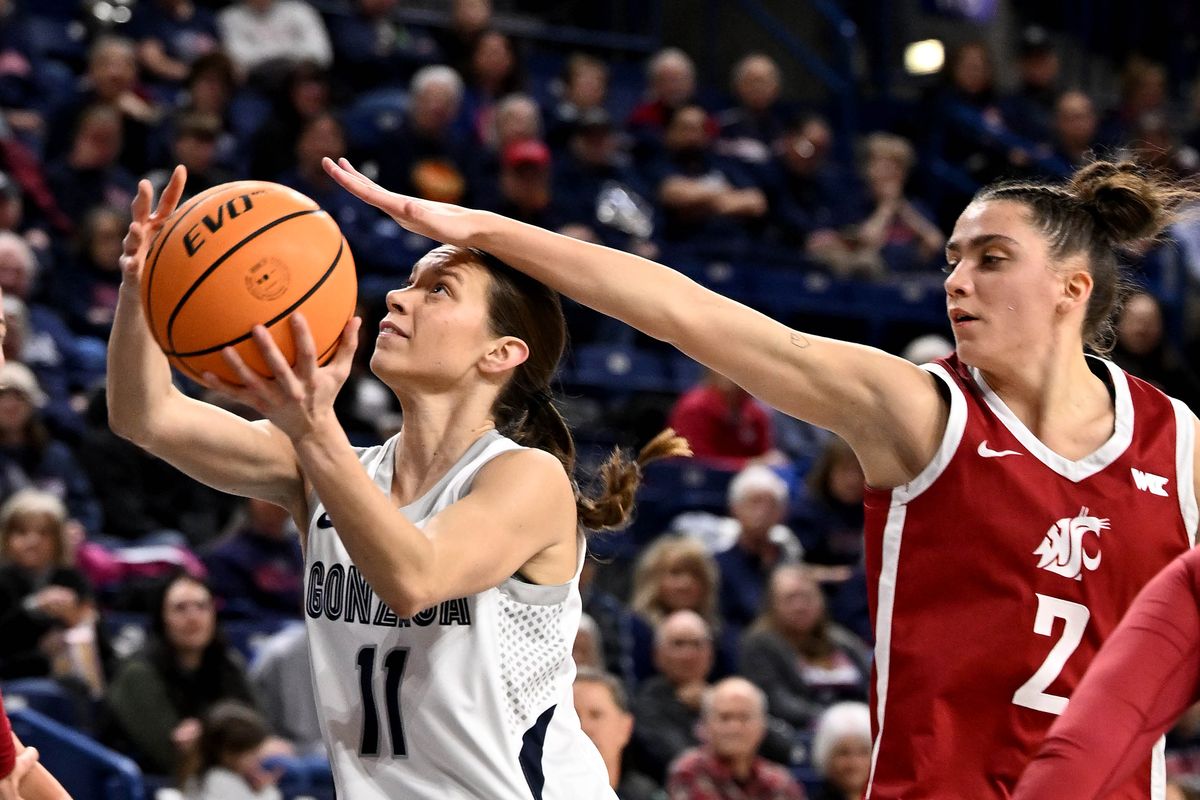 Gonzaga guard Allie Turner (11) eyes the basket as Washington State guard Eleonora Villa (2) reaches for the ball during the second half of a NCAA college basketball game, Thursday, Feb. 19, 2026, in the McCarthey Athletic Center.  (COLIN MULVANY/THE SPOKESMAN-REVIEW)