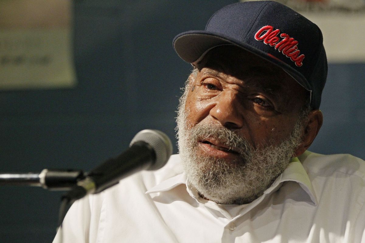 In this Aug. 14, 2012 photo James Meredith, the first black student to integrate the University of Mississippi in 1962, speaks to an audience at a reading at a Jackson, Miss., book store. Meredith
