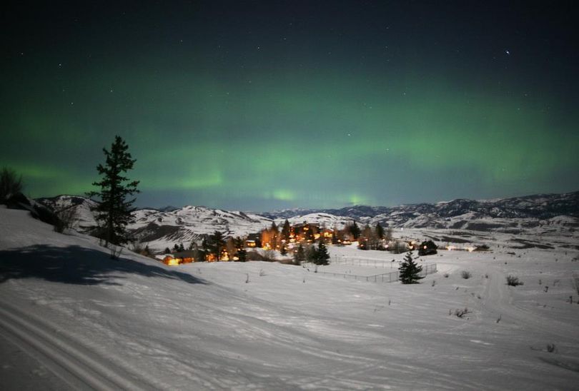 The northern lights glow over the Methow Valley in this hand-held image snapped shortly after midnight on March 8, 2012, by a cross--country ski trail groomer operator. (Methow Valley Sport Trails Association)