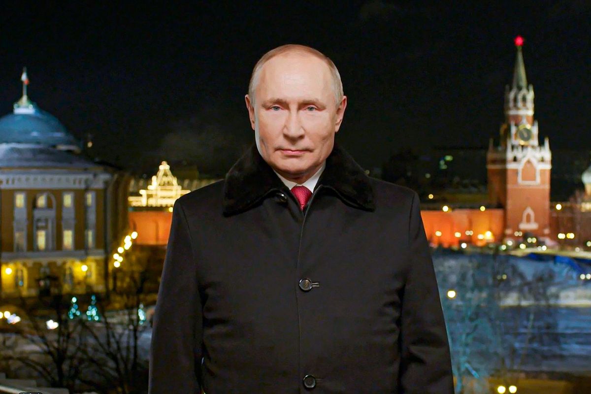 In this photo released by Kremlin Press service on Saturday, Jan. 1, 2022, Russian President Vladimir Putin speaks during a recording of his annual televised New Year