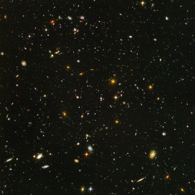 This image made from a composite of September 2003 - January 2004 photos captured by the NASA/ESA Hubble Space Telescope shows nearly 10,000 galaxies in the deepest visible-light image of the cosmos, cutting across billions of light-years. In research released on Friday, April 26, 2019, Nobel winning astronomer Adam Riess calculates the cosmos is between 12.5 and 13.0 billion years old - about 1 billion years younger than previous estimates. (Associated Press)
