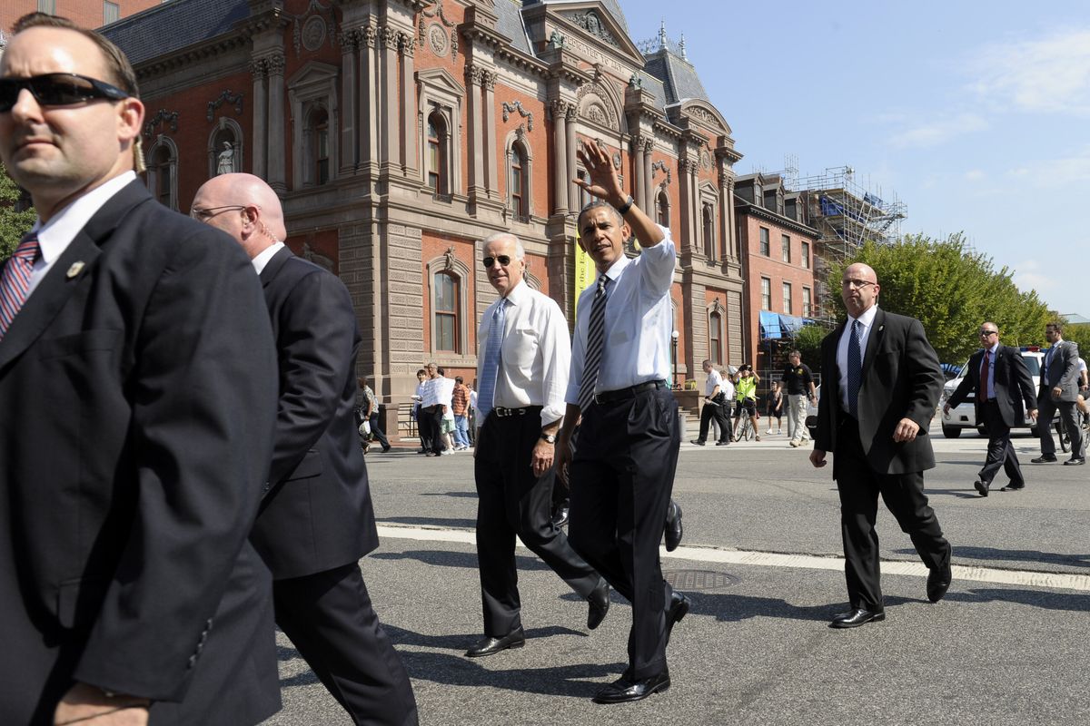 President Barack Obama and Vice President Joe Biden leave the White House on Friday to pick up lunch at the Taylor Gourmet sandwich shop nearby. (Associated Press)