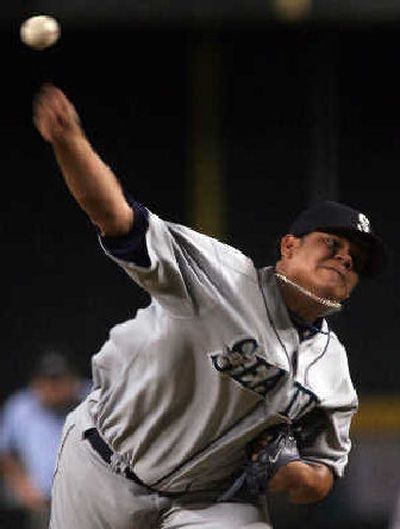 Seattle's Felix Hernandez stifled Arizona for his eighth victory. 
 (Associated Press / The Spokesman-Review)