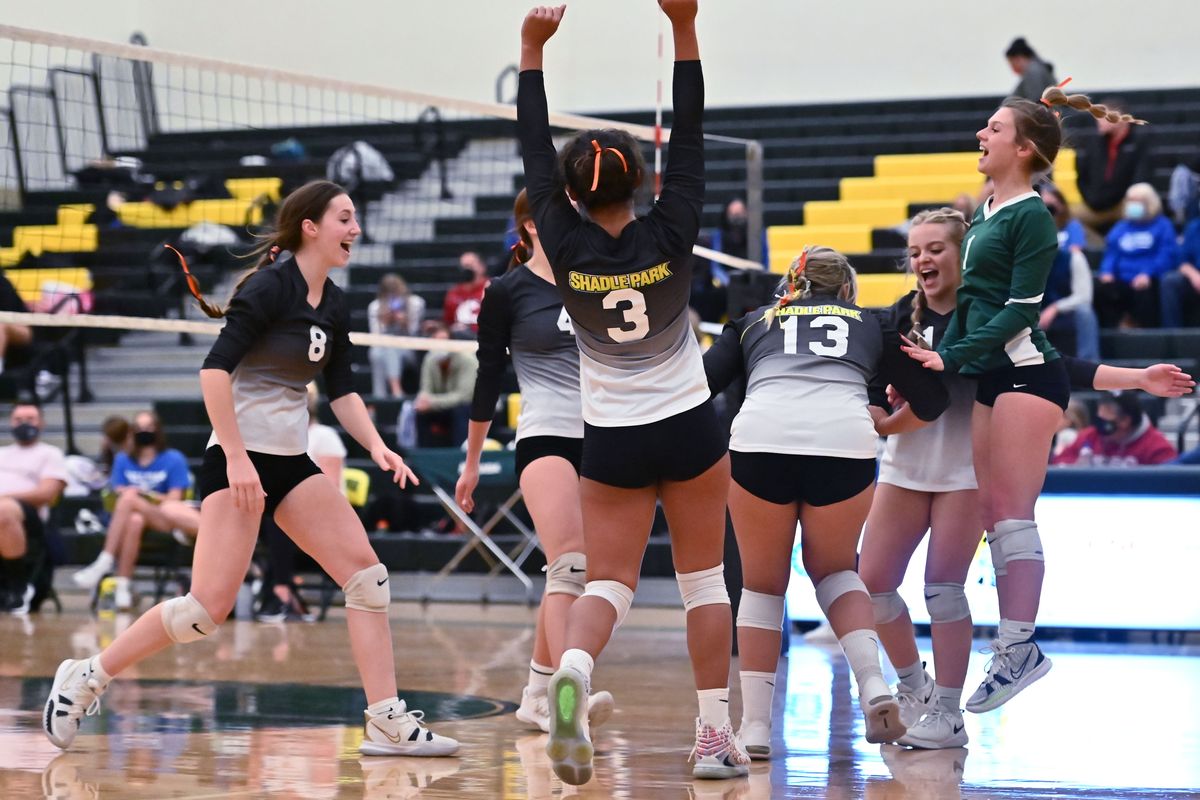 Shadle Park Highlanders celebrate a point during a varsity volleyball game against the Pullman Greyhounds at Shadle Park on Tuesday, Oct 12, 2021 in Spokane WA.   (James Snook For The Spokesman-Review)