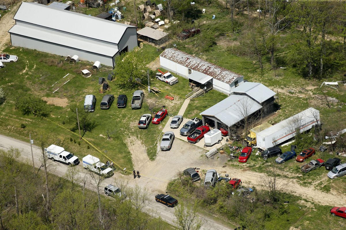 This aerial photo shows one of the locations being investigated in Pike County, Ohio, as part of an ongoing homicide investigation, Friday, April 22, 2016. Several people were found dead Friday at multiple crime scenes in rural Ohio, and at least most of them were shot to death, authorities said. No arrests had been announced, and it’s unclear if the killer or killers are among the dead. ( (Lisa Marie Miller / The Columbus Dispatch via AP)