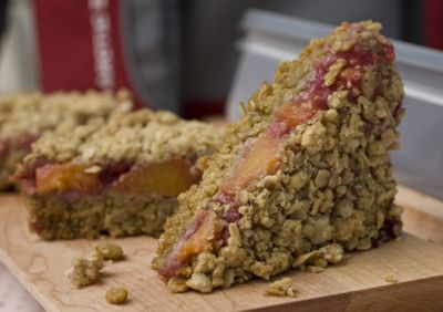 Oatmeal, Raspberry and Peach Snack Bars are budget-friendly alternatives to pricey, store-bought snacks.  (Associated Press / The Spokesman-Review)