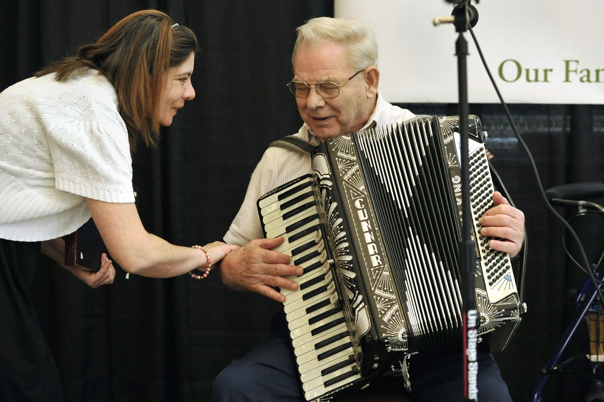 Gunnar Wold professed to being a little nervous as he prepared to compete in the Parkway Village talent show Tuesday in Spokane. Life enrichment director Tammy Montgomery speaks to Wold, who then performed “Saturday Night Waltz.” (Dan Pelle)