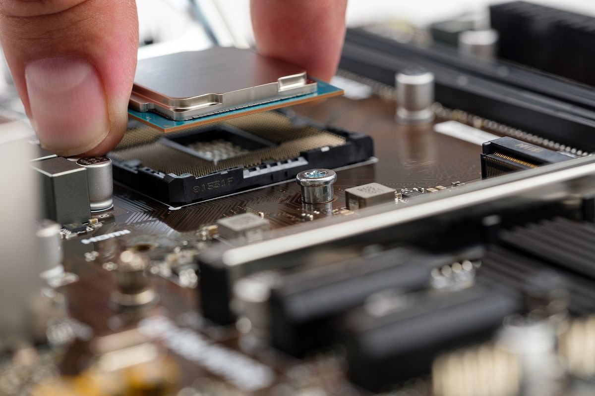 A central processing unit or computer chip is installed on a computer motherboard.  (Pixabay)