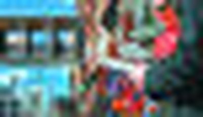 
Jessica Moll, a poetry graduate student at Eastern Washington University, performs a Milk Crate Reading in front of River Park Square on Thursday. 
 (Jed Conklin / The Spokesman-Review)