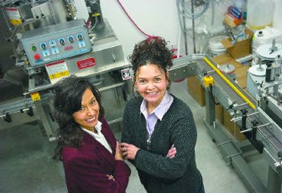 
Sister Sky owners Monica Simeon, left, and Marina TurningRobe bought bottling and labeling equipment and moved their shampoo, conditioner, lotion and soap business from their Spokane homes to  the Spokane Indian Reservation. Their company's main target is Indian casino resorts. 
 (Photos by Jed Conklin / The Spokesman-Review)